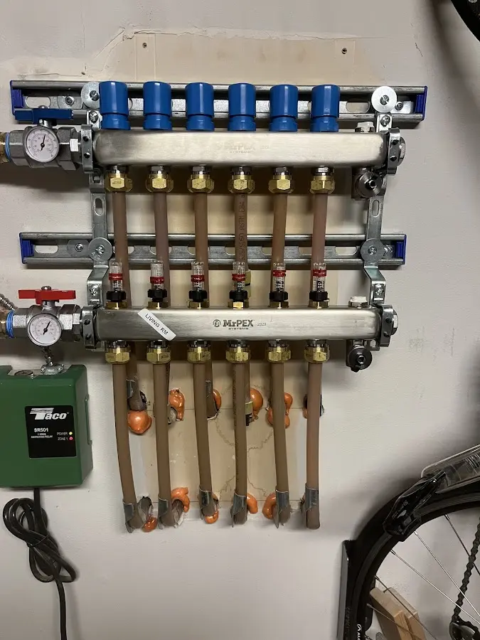 Plumber performing Gas Line Installation at a residential property in Spring Creek